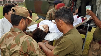 Pakistani soldiers moved Malala Yousafzai to an army hospital in Peshawar after Pakistani Taliban militants attacked her in the Swat Valley last year.Credit...Agence France-Presse — Getty Images